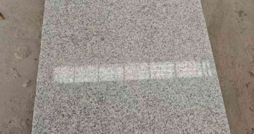 浙江芝麻白光面毛板