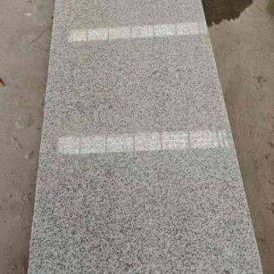 浙江芝麻白光面毛板