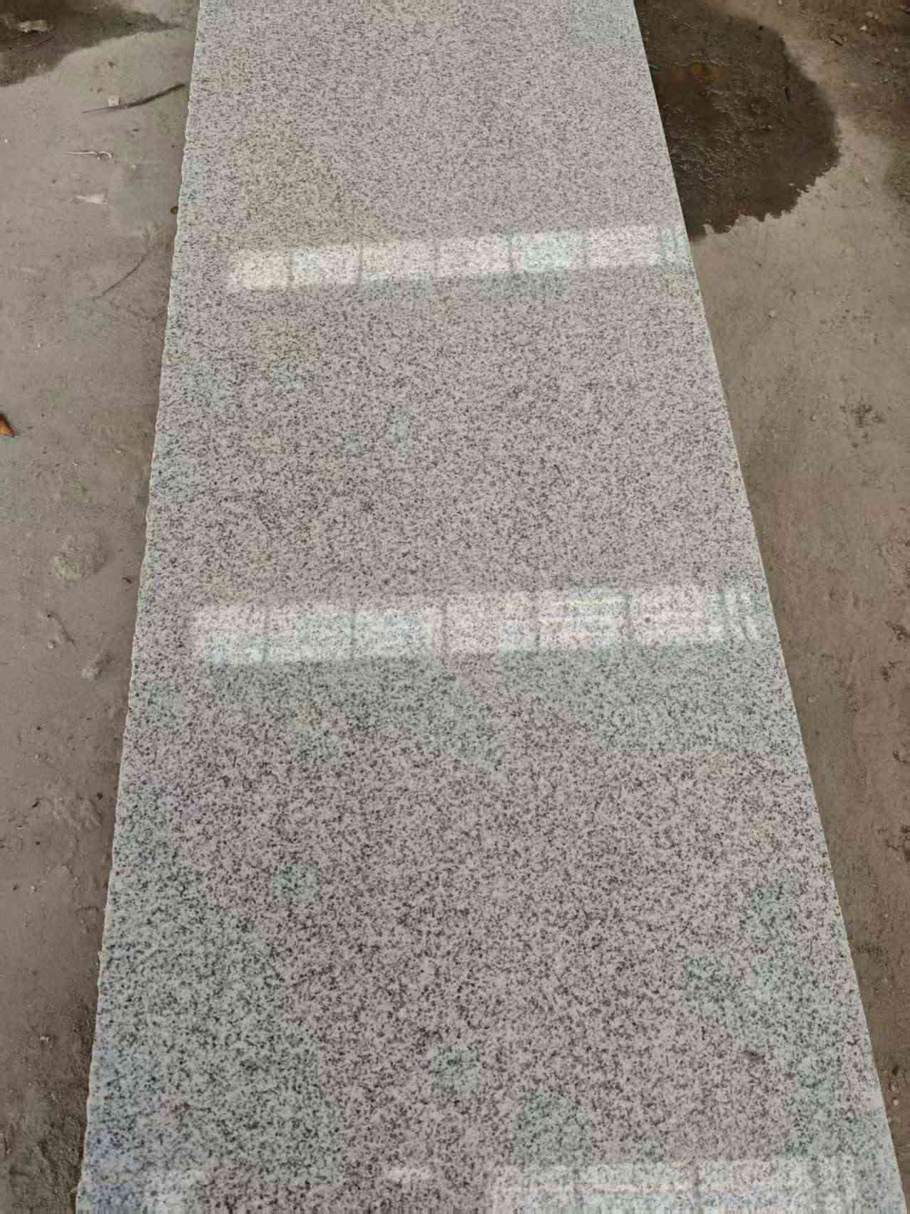 浙江芝麻白光面毛板